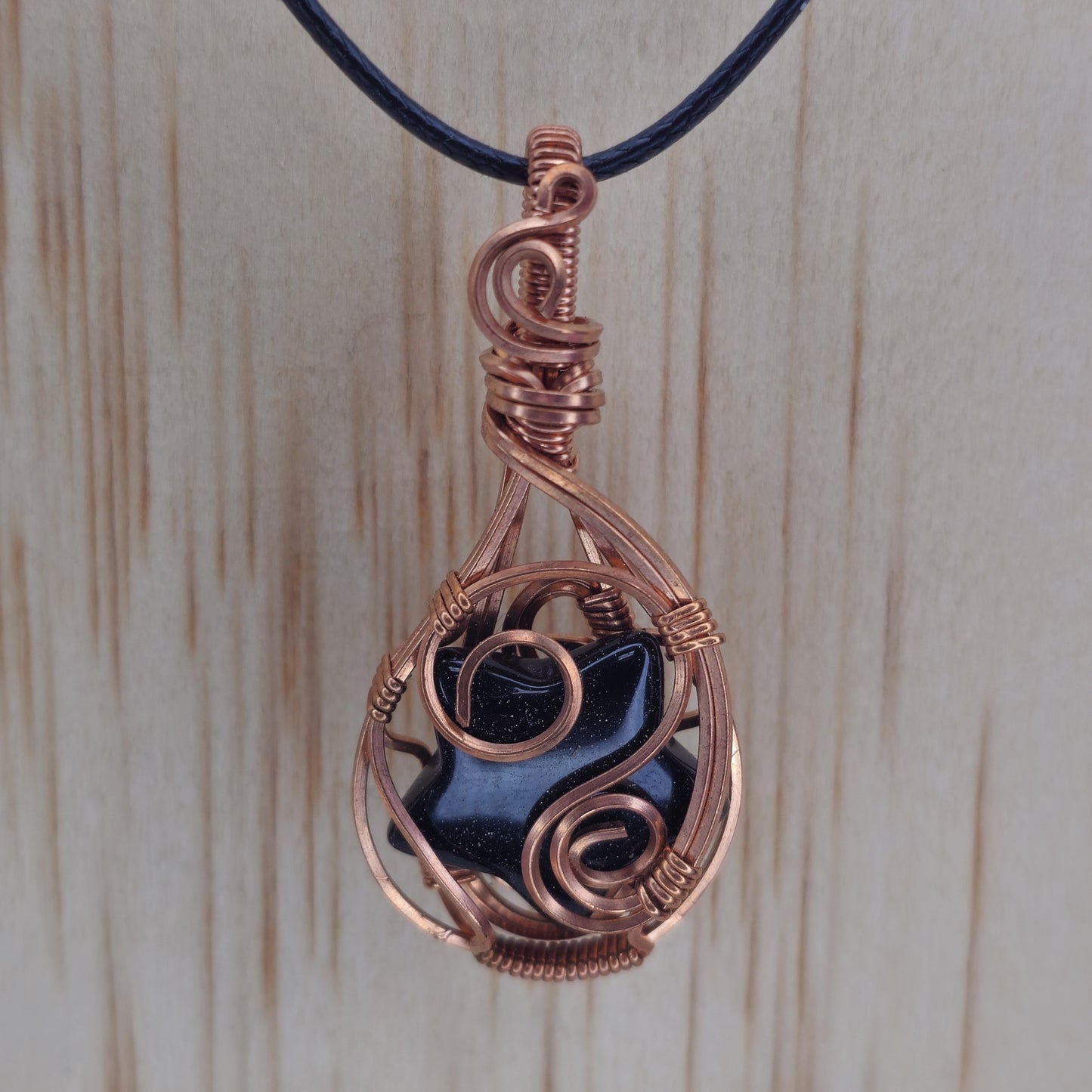 Obsidian Star Shaped Crystal Pendant - Wire Wrapped