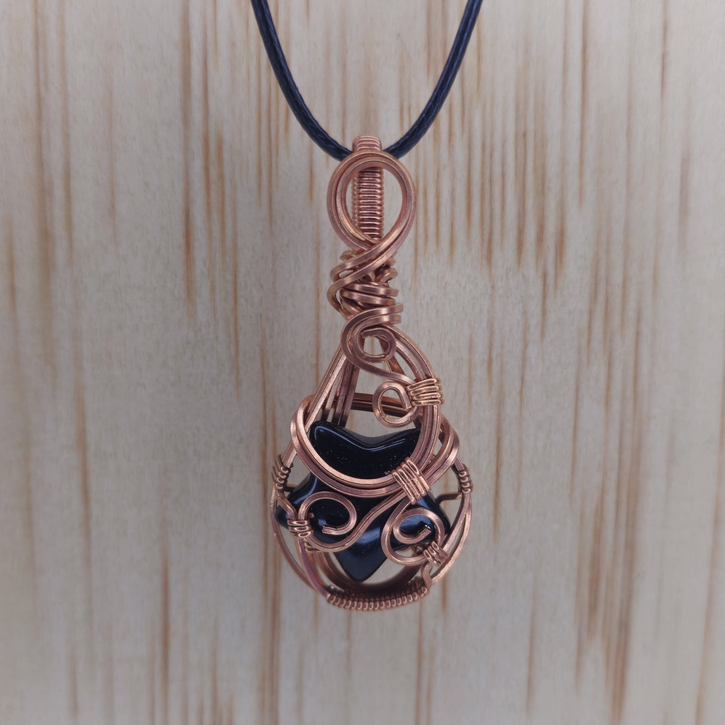 Obsidian Star Shaped Crystal Pendant - Wire Wrapped